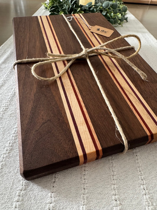 Black walnut with maple, Purple Heart and okoume wood strips cutting board
