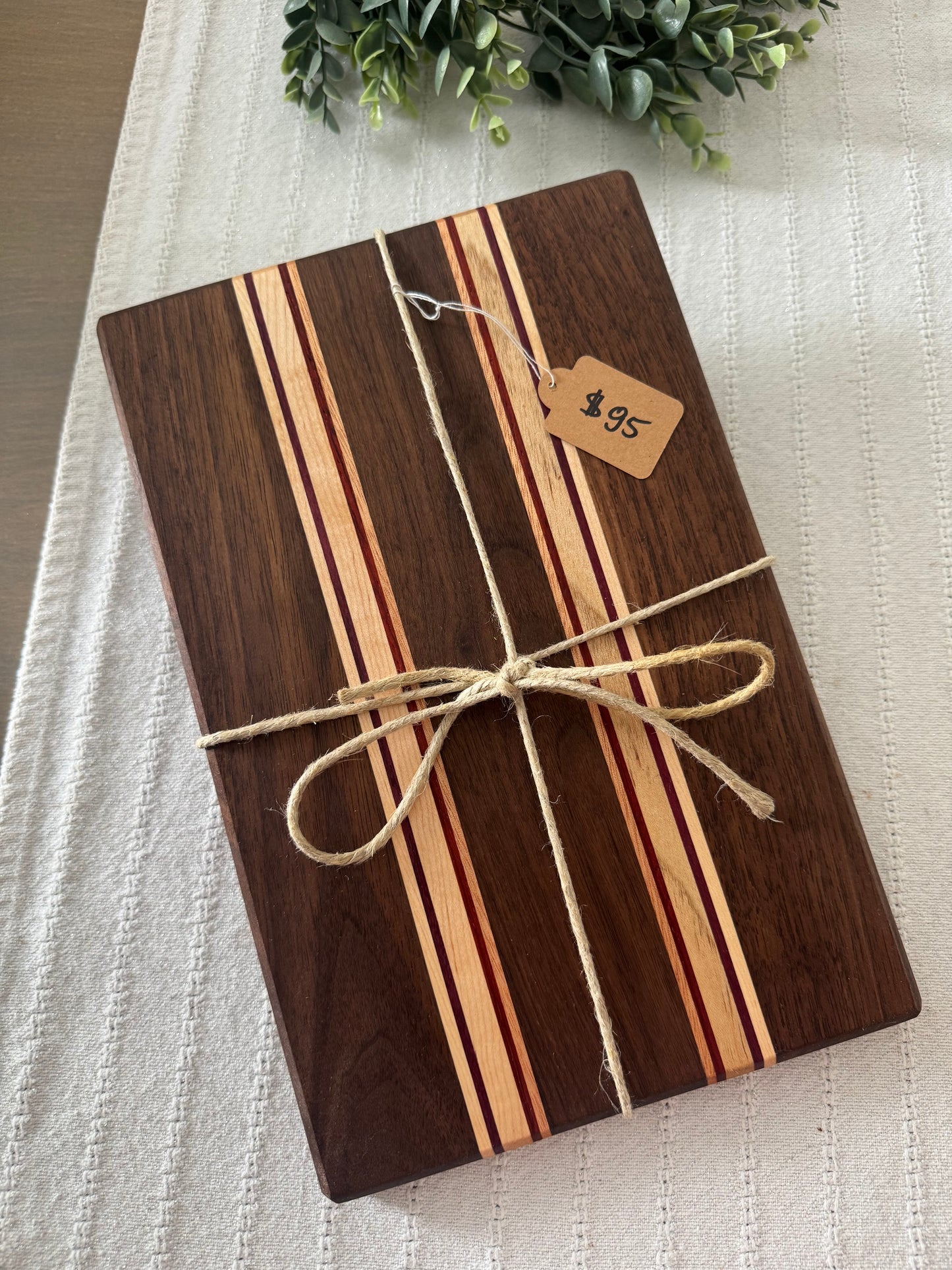 Black walnut with maple, Purple Heart and okoume wood strips cutting board